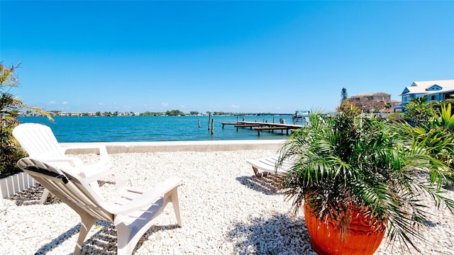 water view with a dock and a beach view