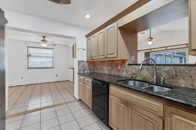 kitchen with backsplash, dishwasher, dark stone countertops, sink, and light tile patterned floors