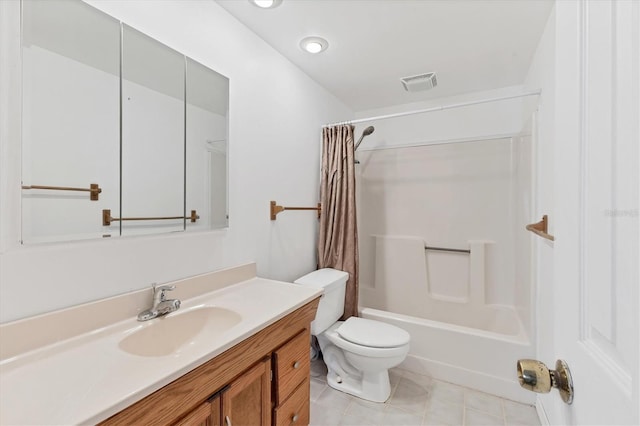 full bathroom featuring toilet, vanity, and shower / bath combination with curtain