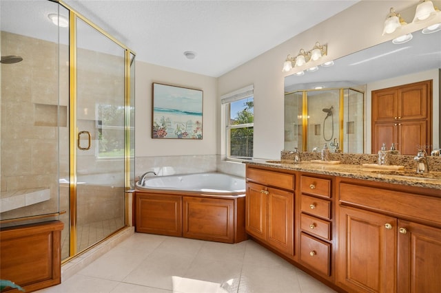 bathroom with plus walk in shower, tile patterned floors, and vanity