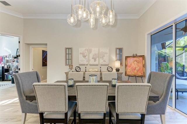 dining room featuring crown molding