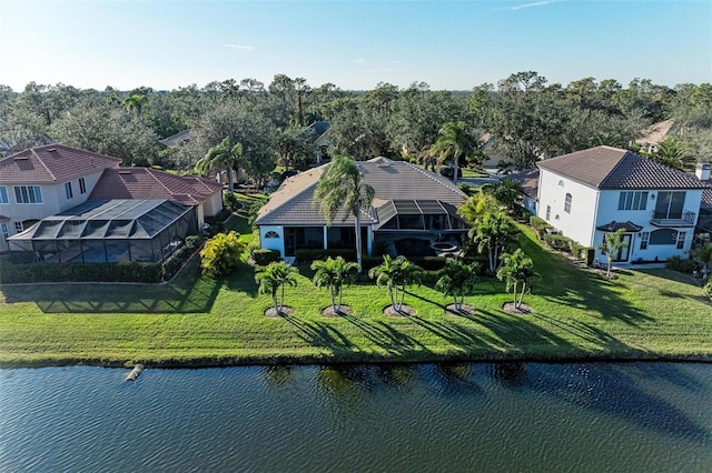 birds eye view of property featuring a water view