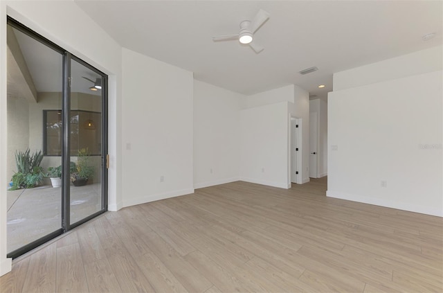 unfurnished room featuring ceiling fan and light hardwood / wood-style floors