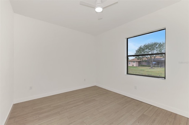 spare room with ceiling fan and light hardwood / wood-style floors