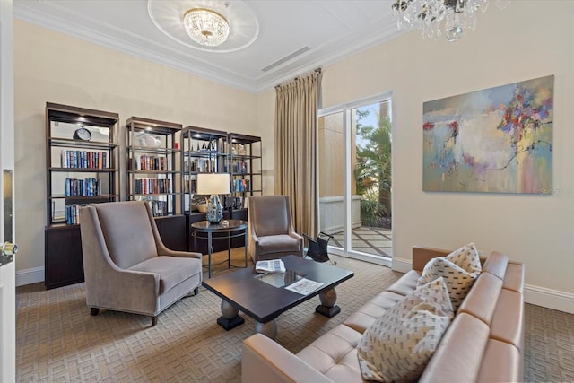 living area featuring carpet flooring, ornamental molding, and an inviting chandelier