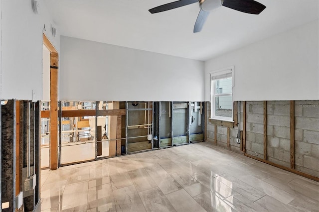 spare room with ceiling fan and visible vents