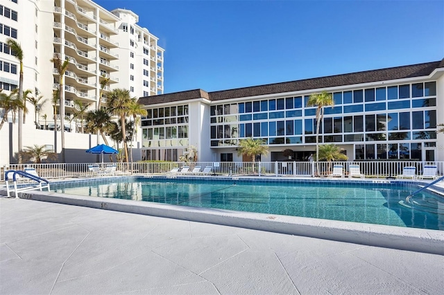 community pool with fence