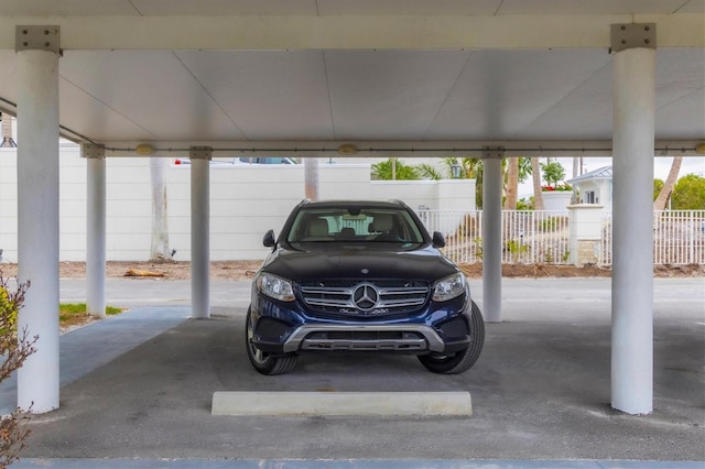 garage featuring fence