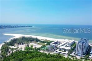 bird's eye view featuring a water view and a city view