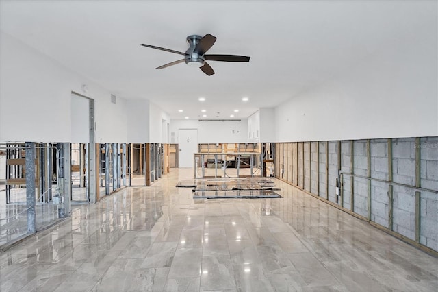 interior space featuring ceiling fan, marble finish floor, visible vents, and recessed lighting