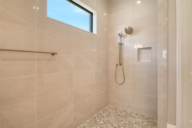 10612 Nicklaus Ct, Englewood, FL 34223 - full bathroom featuring tiled shower
