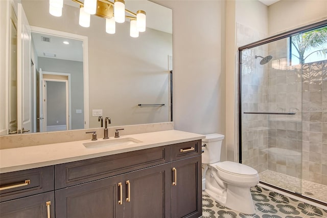 10612 Nicklaus Ct, Englewood, FL 34223 - bathroom with toilet, tiled shower, vanity, and tile patterned flooring