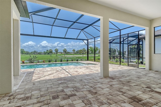 10612 Nicklaus Ct, Englewood, FL 34223 - swimming pool with a patio area and glass enclosure