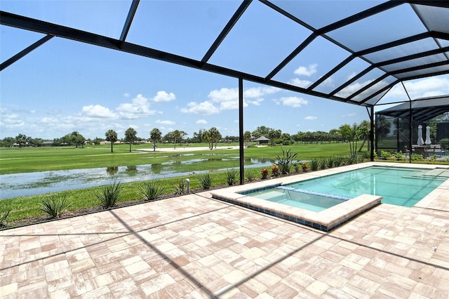 10612 Nicklaus Ct, Englewood, FL 34223 - view of swimming pool featuring a water view, glass enclosure, a patio, and a yard