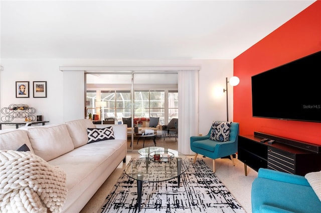 living area featuring speckled floor