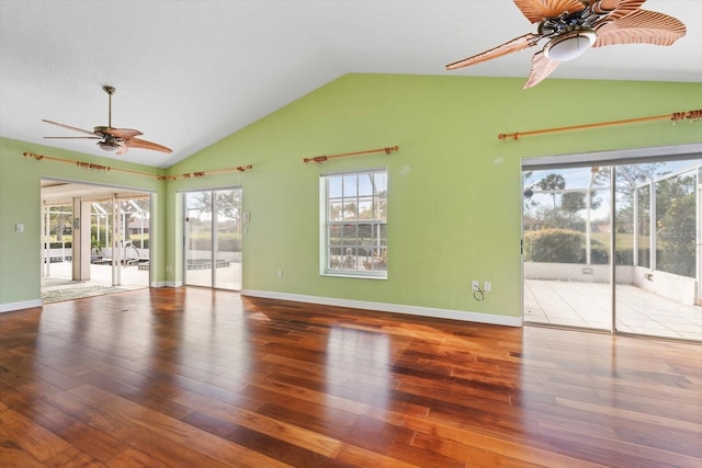 unfurnished living room featuring hardwood / wood-style floors, ceiling fan, and lofted ceiling