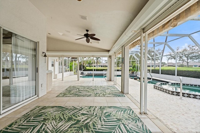 sunroom / solarium with ceiling fan, plenty of natural light, a swimming pool, and lofted ceiling