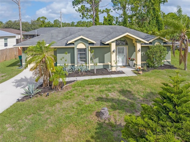 ranch-style house with a front lawn