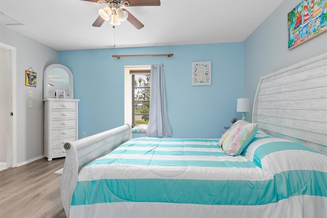 bedroom featuring ceiling fan and light wood-type flooring