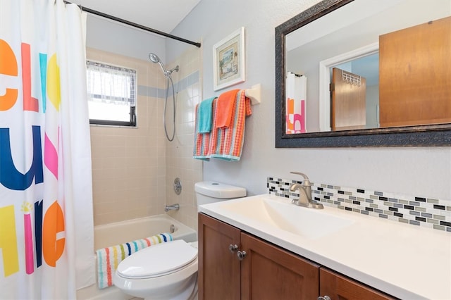 full bathroom featuring decorative backsplash, vanity, shower / tub combo with curtain, and toilet