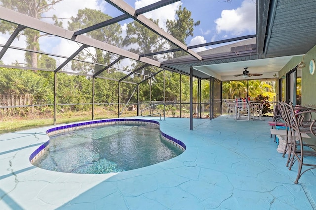 view of pool featuring a lanai, ceiling fan, and a patio