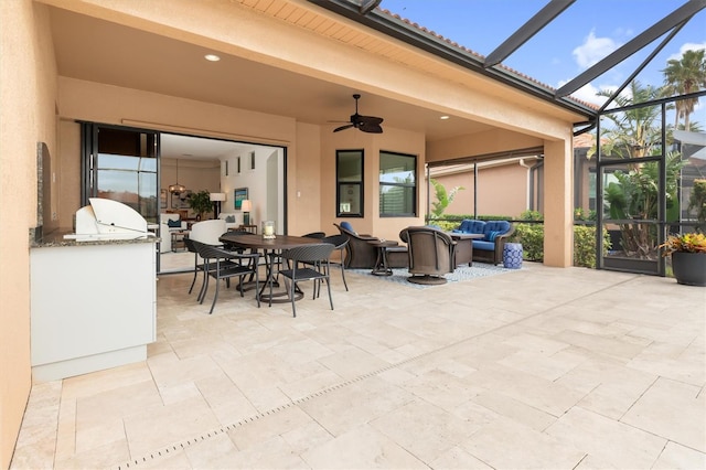 view of patio / terrace featuring outdoor lounge area, ceiling fan, and a lanai