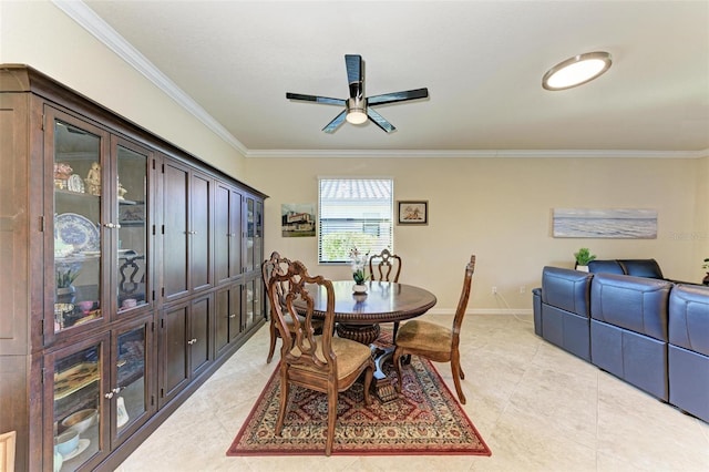 dining room featuring ceiling fan, light tile patterned floors, and ornamental molding