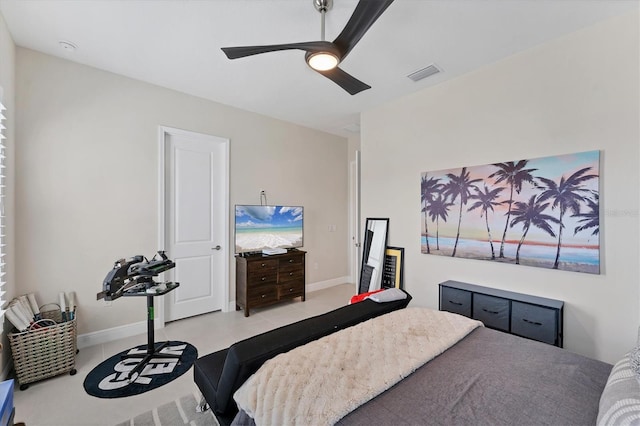 tiled bedroom with ceiling fan