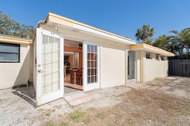 back of property featuring french doors