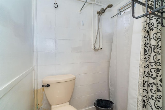 bathroom with a shower with shower curtain