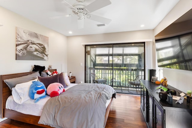 bedroom featuring access to outside, ceiling fan, and dark wood-type flooring