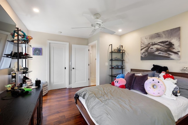 bedroom featuring dark hardwood / wood-style floors and ceiling fan