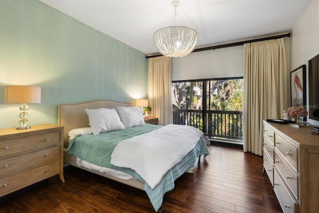 bedroom with a chandelier, access to outside, and dark hardwood / wood-style floors