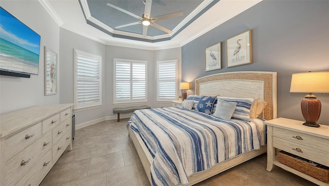 bedroom with a raised ceiling, ceiling fan, and ornamental molding