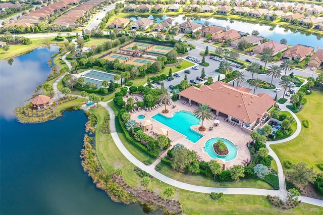 bird's eye view with a water view