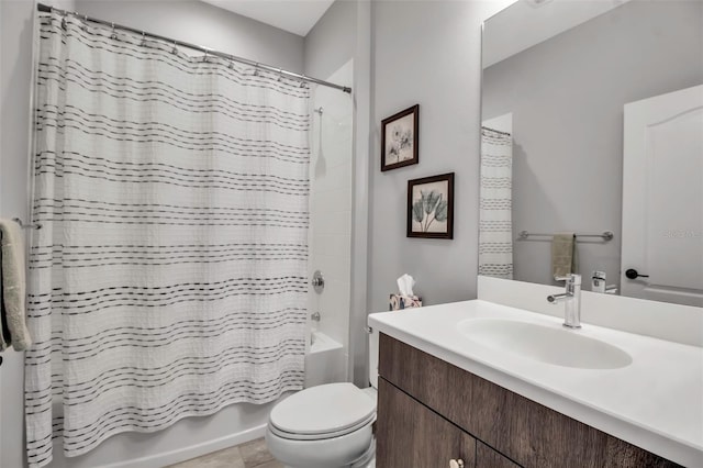 full bathroom with tile patterned floors, shower / bath combo, toilet, and vanity