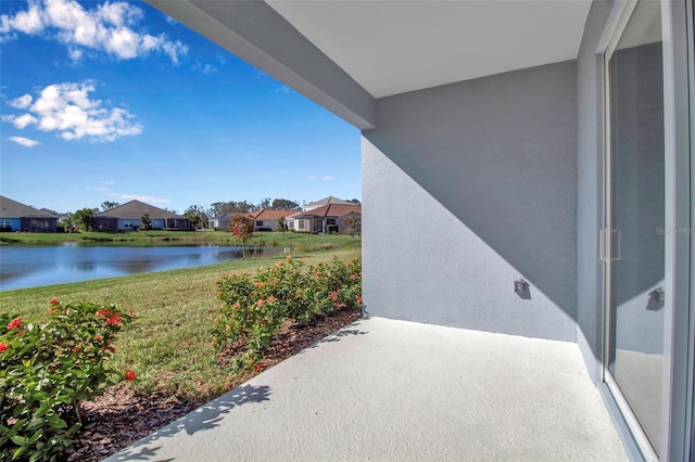 view of patio / terrace with a water view