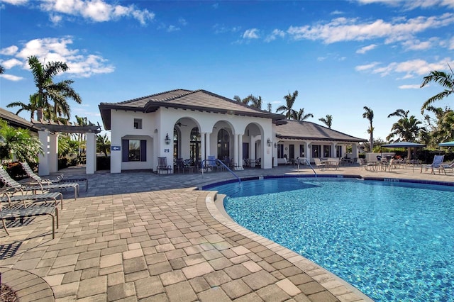 view of pool featuring a patio area