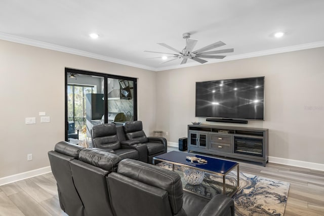 living room featuring light wood-type flooring and crown molding