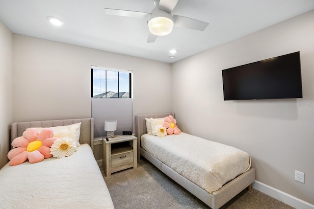 carpeted bedroom featuring ceiling fan