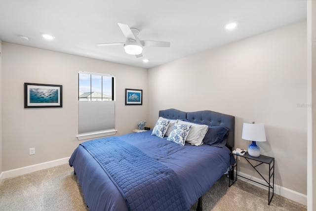 bedroom with ceiling fan and carpet flooring