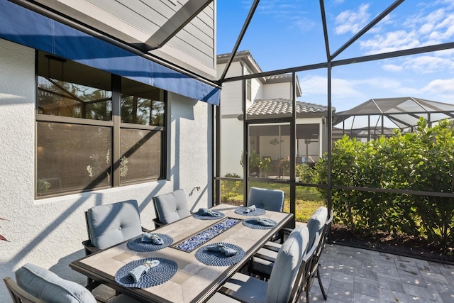 view of patio with a lanai