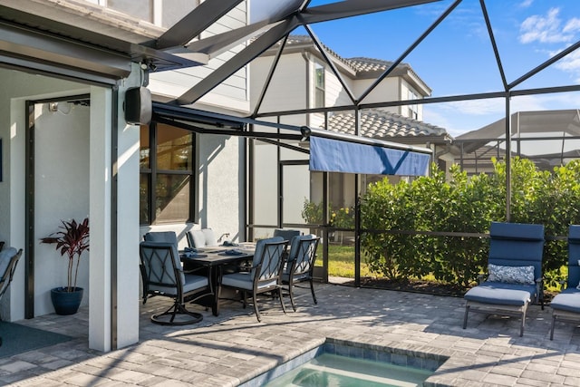 view of patio with a lanai