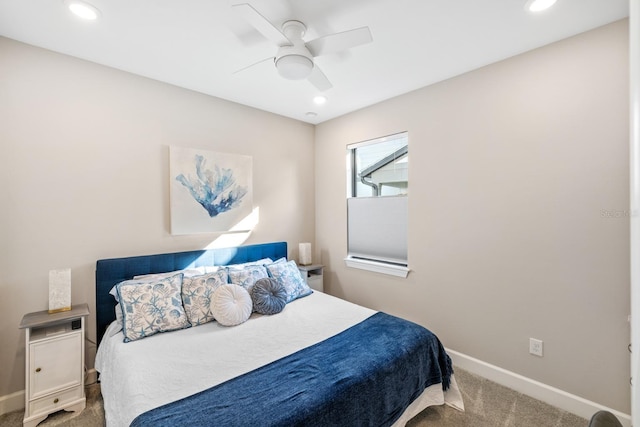 carpeted bedroom featuring ceiling fan