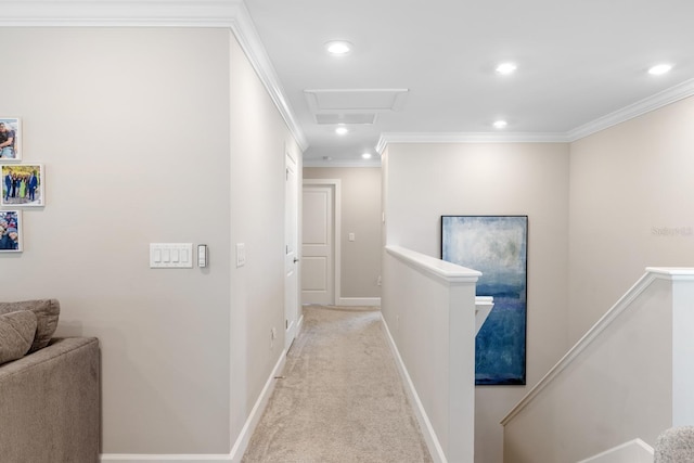 hall featuring light carpet and crown molding