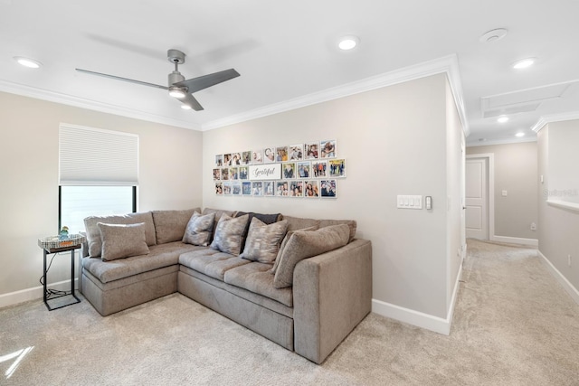 carpeted living room featuring ceiling fan and ornamental molding