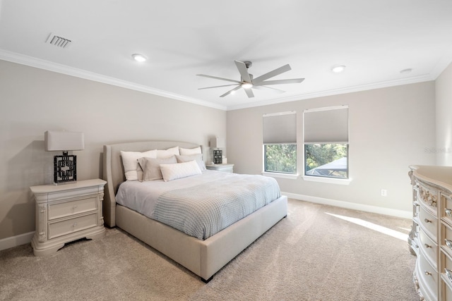 bedroom with ceiling fan, light colored carpet, and ornamental molding