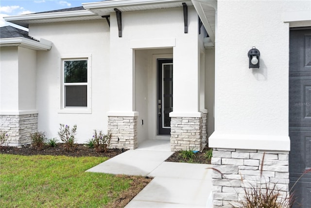 doorway to property with a porch