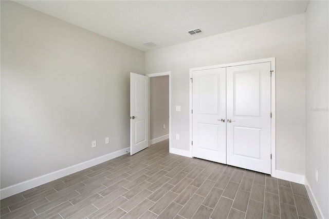 unfurnished bedroom featuring a closet