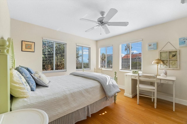 bedroom featuring ceiling fan and light hardwood / wood-style flooring